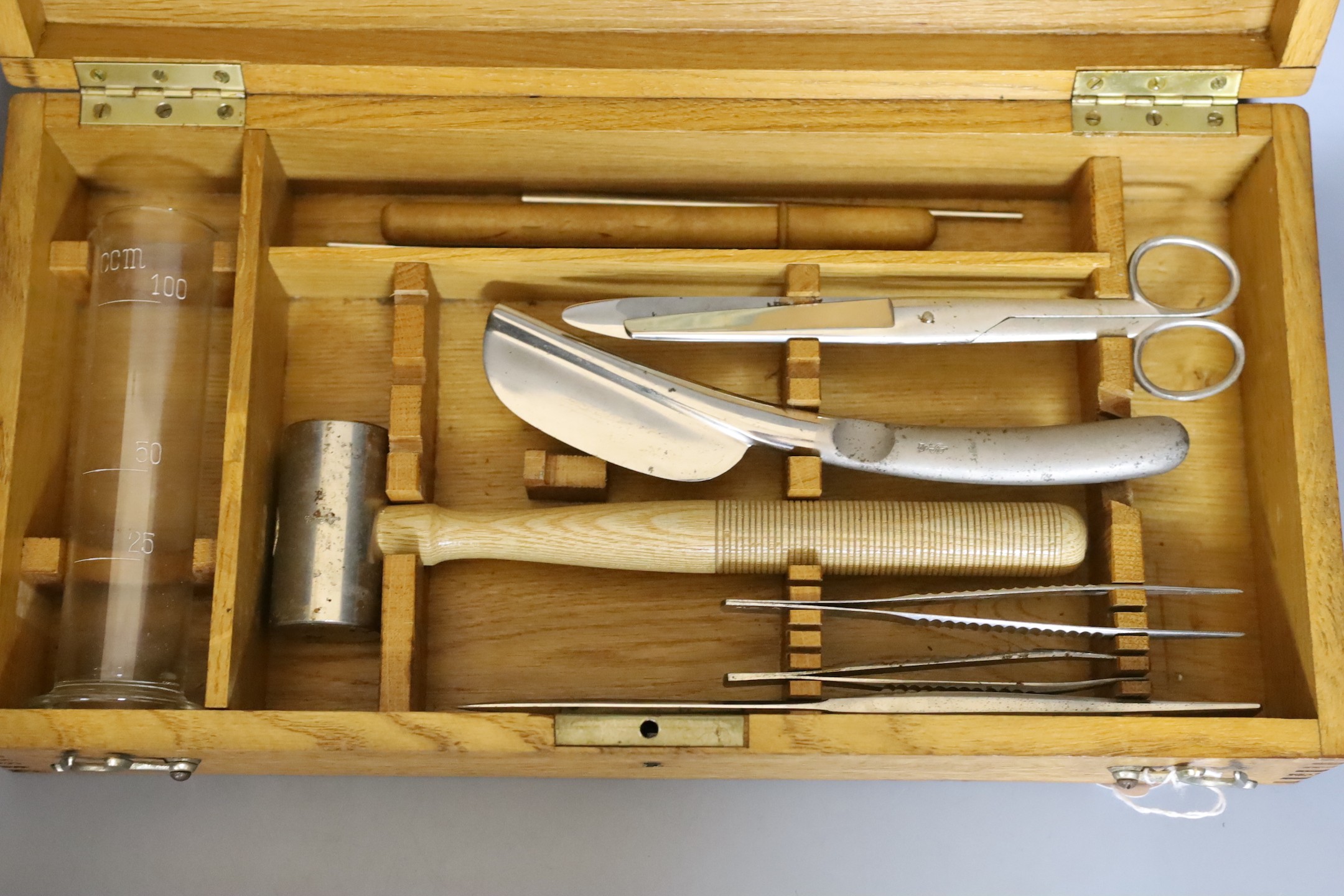 An Aesculap oak cased German autopsy kit